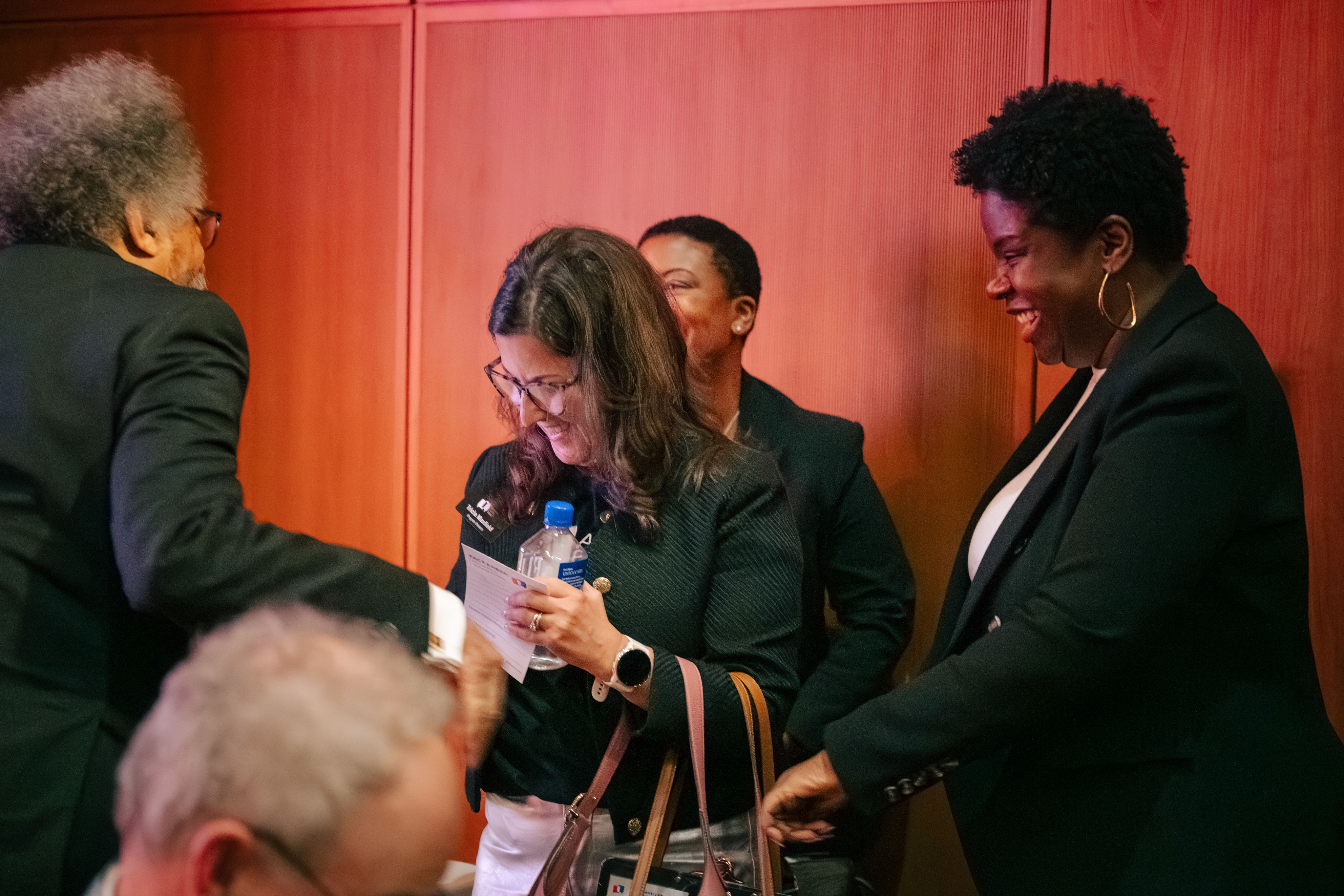 Cornel West, Blair LM Kelley, and others enjoying company and conversation