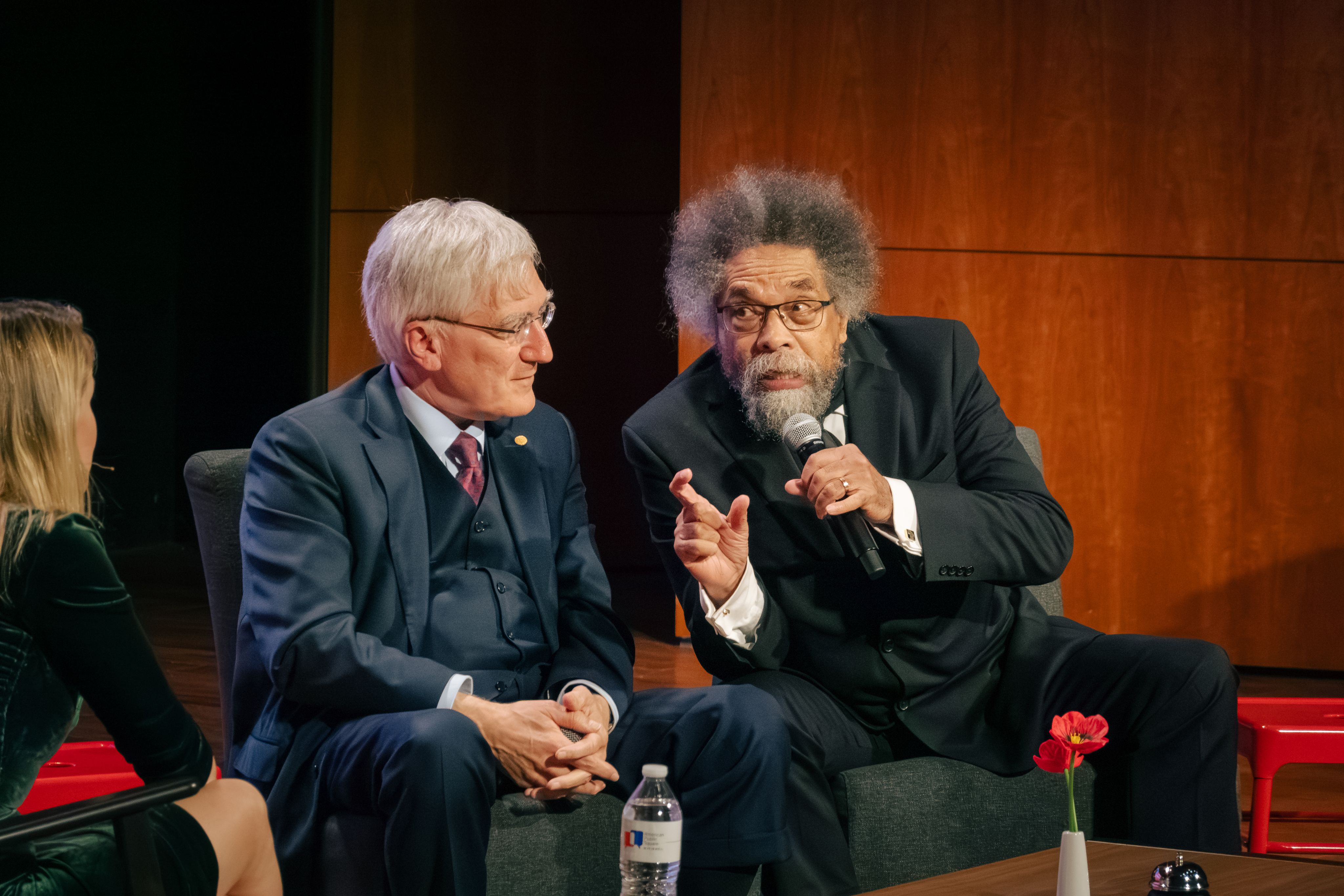 Cornel West delivers some remarks to his conversation partners Robert George and Jane Ferguson