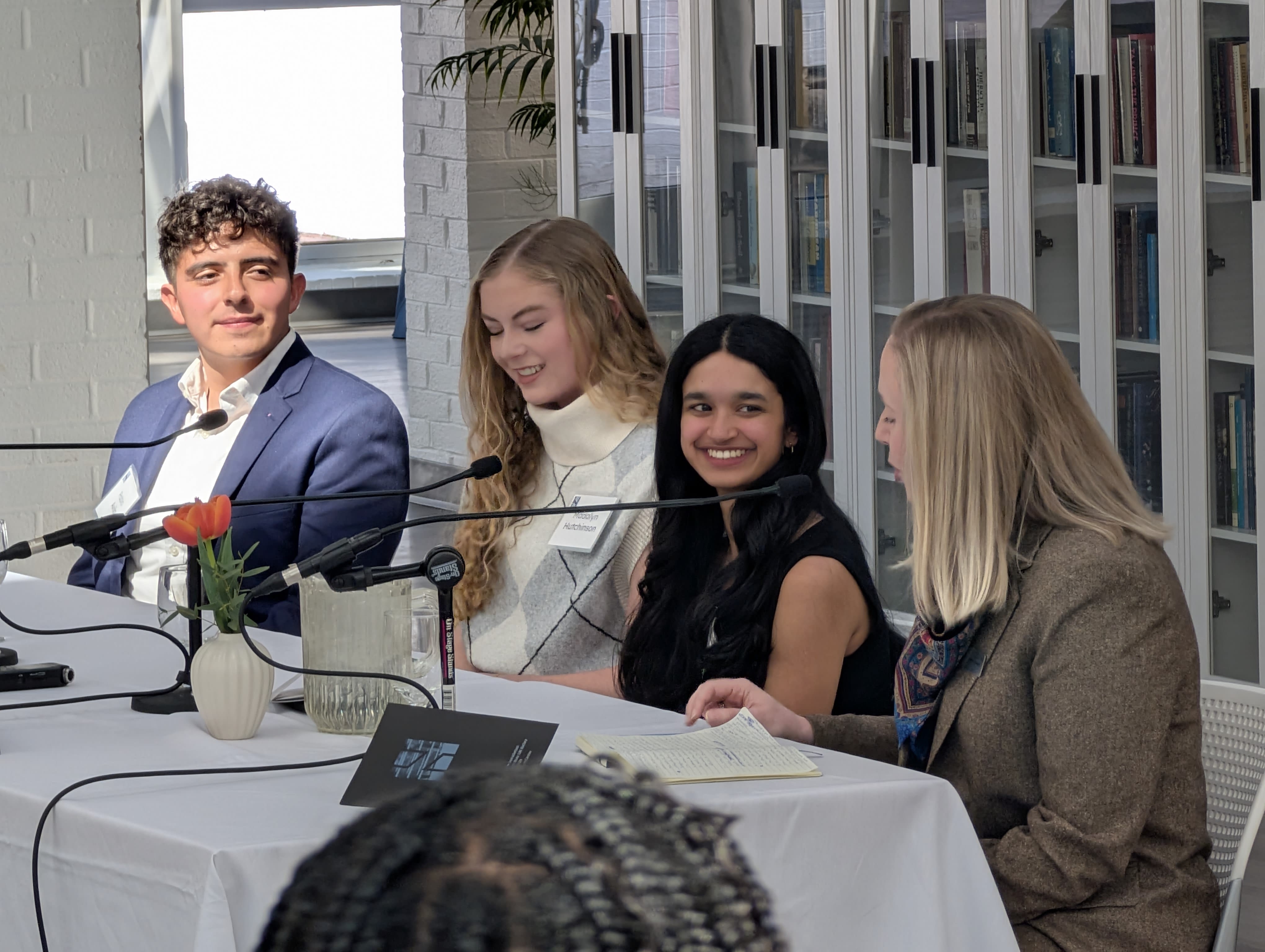 NHC Emerging Scholars Panel, depicted from left to right: Pablo Ávila, Madalyn Hutchinson, Trisha Santanam; moderator: Jacqueline Kellish, Vice President for Public Engagement