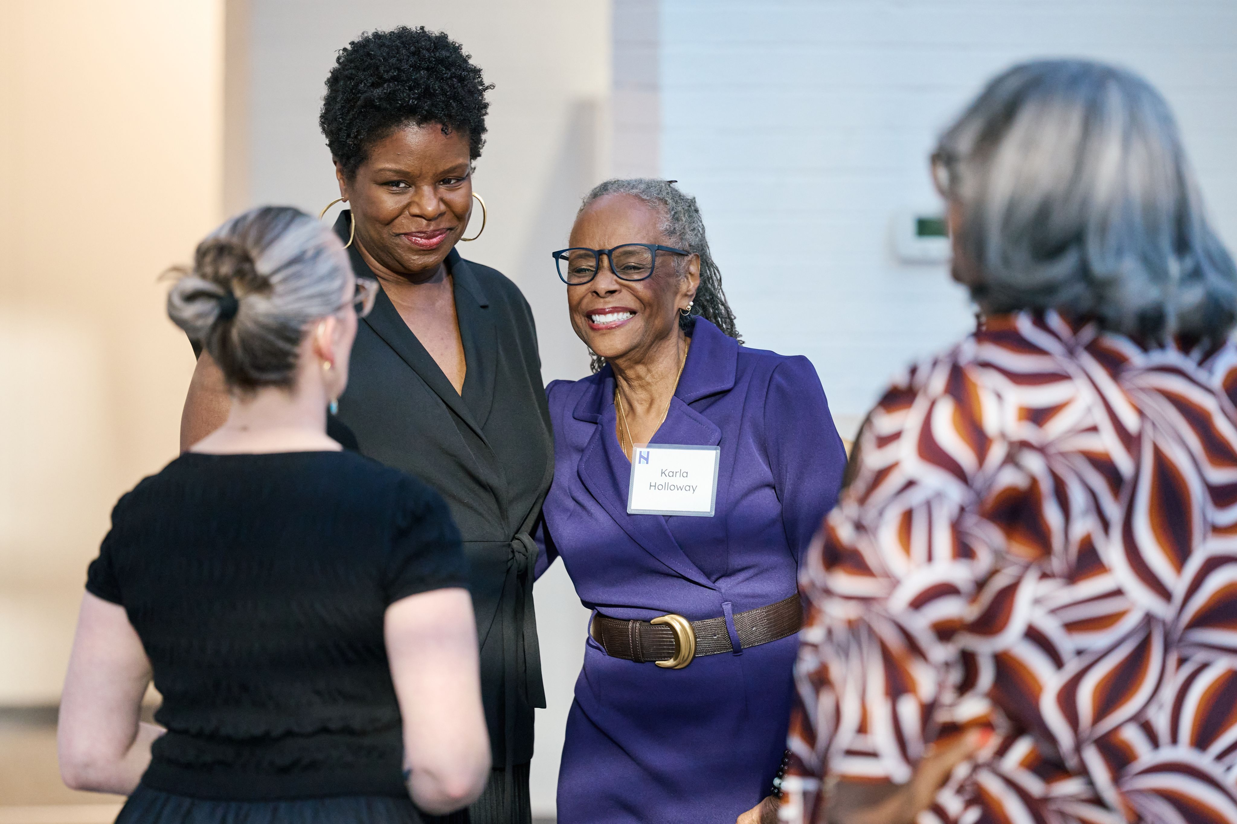 Blair LM Kelley with installation attendees